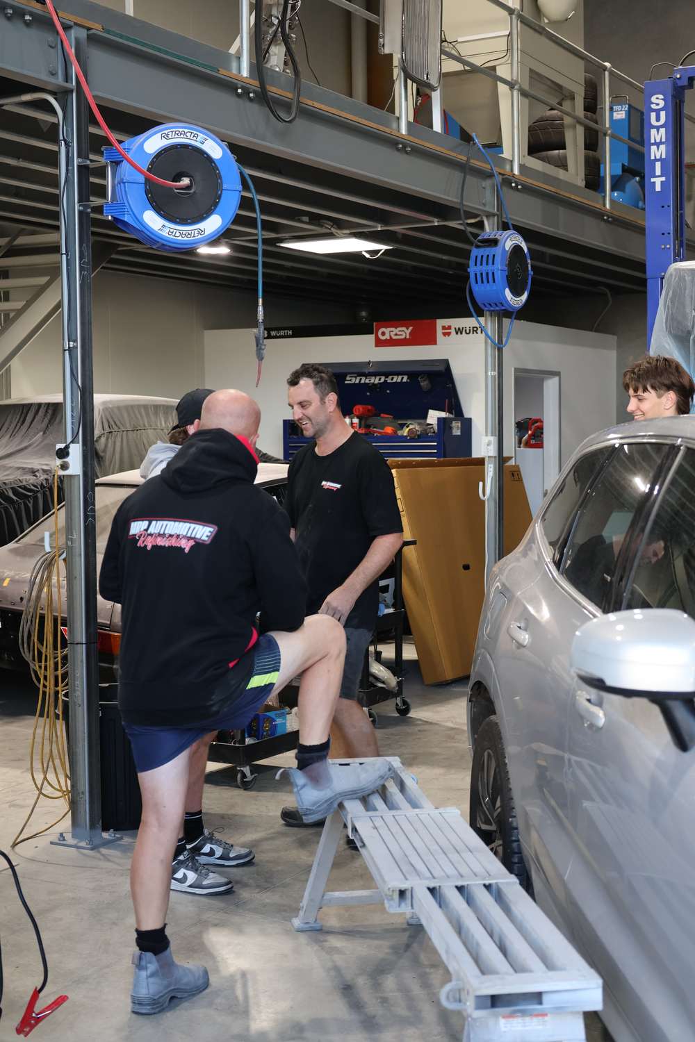 MRP technicians repairing collision damage in the Redland Bay workshop